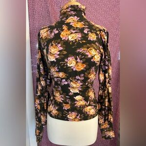Anthropologie Black and Orange Floral turtle neck fitted with cute sleeve detail